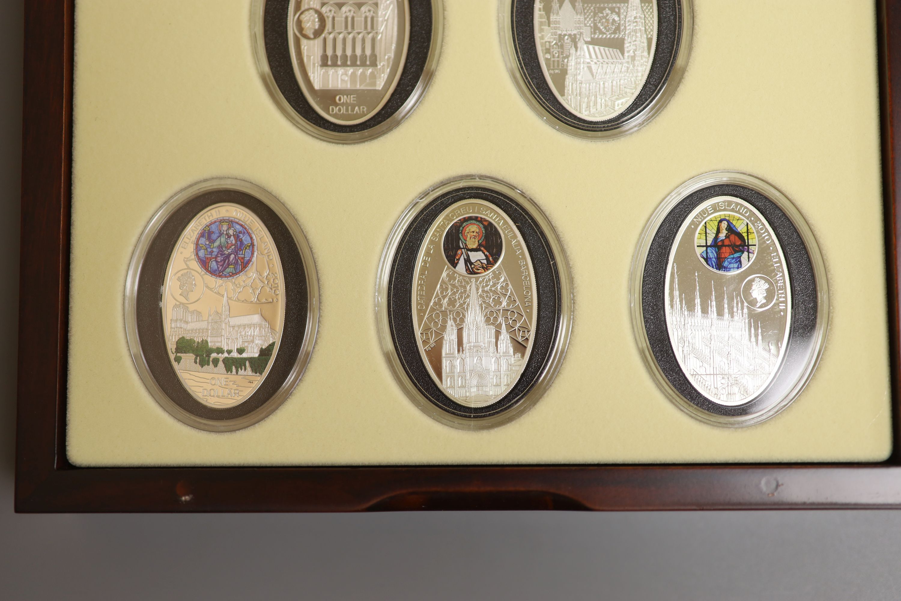 A BH Meyer Mint Niue Island cased set of eight $1 proof coins, each 28.28g